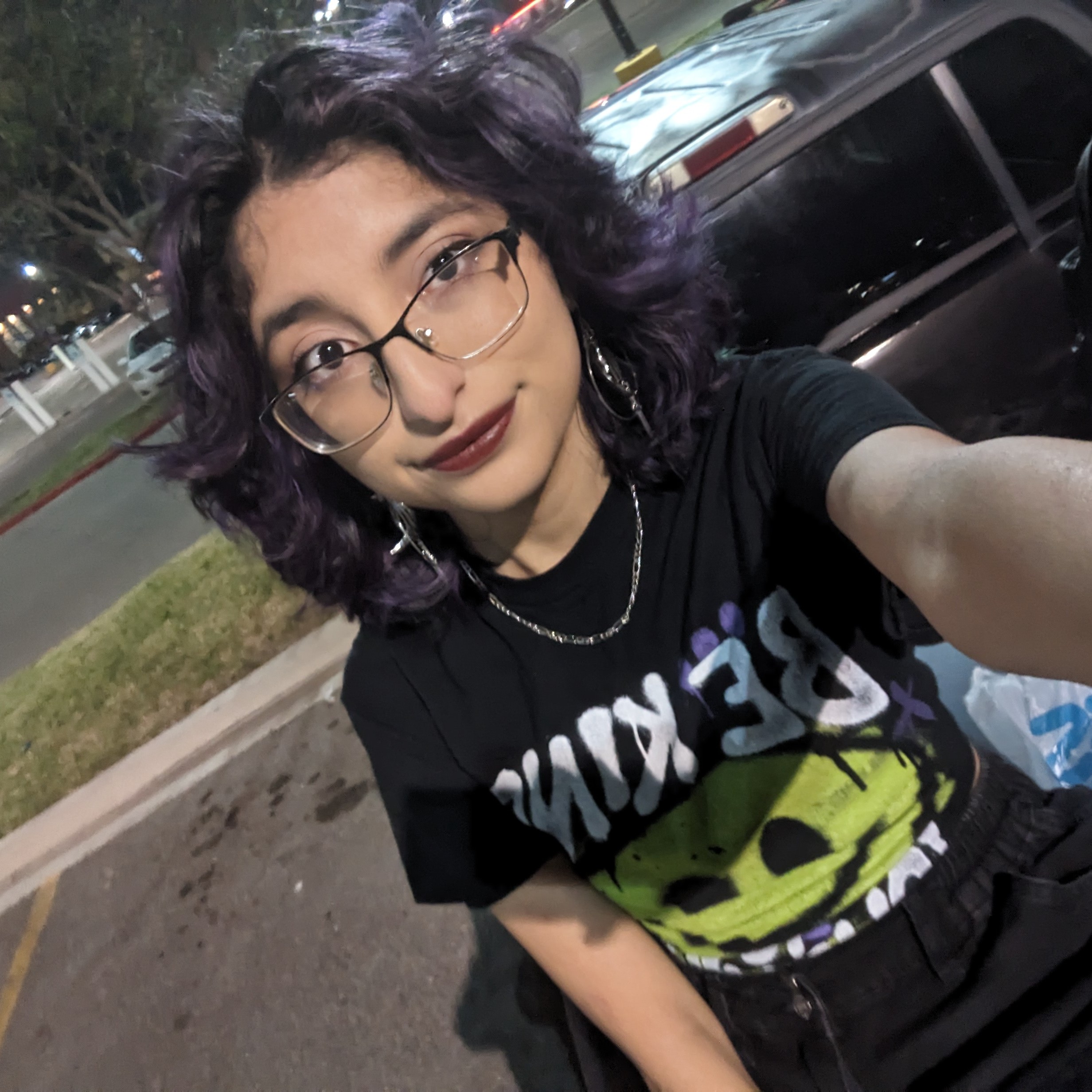 Photo of Astrid in a parking lot